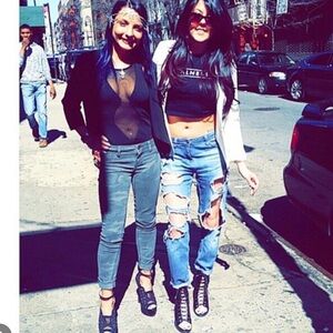 Signature black body suit with sheer cut outs